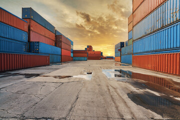 cargo site of logistics service with box container stacking in dockyard