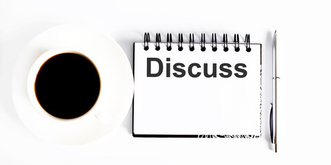 Poster - Text DISCUSS , planning concept. notebook with text on white background with coffee