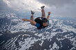 © sindret - Skydivers over snowy mountains in Norway