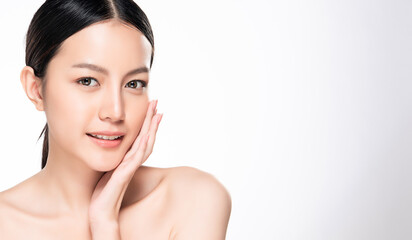 beautiful young asian woman with clean fresh skin, on white background, face care, facial treatment,