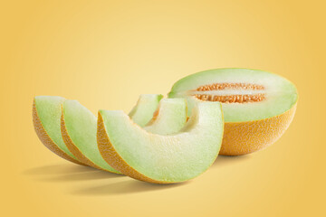 Wall Mural - half melon and three slices on yellow background, summer concept