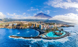 Fototapeta  - Aerial view with Puerto de la Cruz, in background Teide volcano, Tenerife island, Spain

