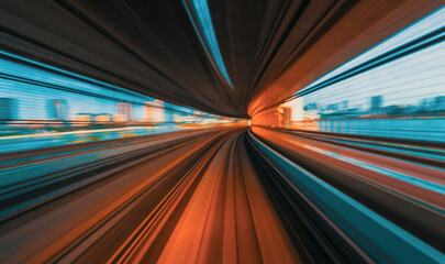 Abstract high speed technology POV train motion blurred concept from the Yuikamome monorail in Tokyo, Japan