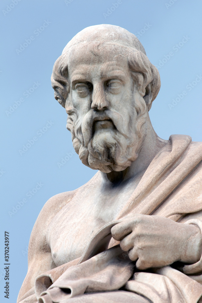 Close up of the marble statue of the ancient Greek philosopher Plato in front of National Academy of Athens / Greece .Cloudy day - obrazy, fototapety, plakaty 