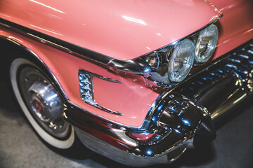 Poster - beautiful retro car of pink color.