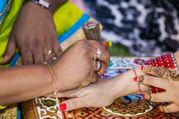 Indian Hindu bride's wedding henna mehendi menhdi hands close up