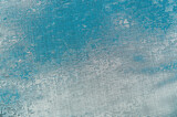 Fototapeta Dmuchawce - blurred blue sky with clouds visible through metal fine mesh