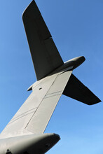 A Close-up Of A Tail Of A Plane