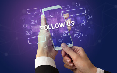 Poster - Female hand typing on smartphone with FOLLOW US inscription, social media concept
