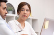 © sopradit - Business asian woman happy working job on laptop in office.