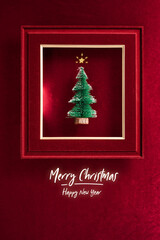 Aufkleber - Merry Christmas and happy new year text and Christmas tree in felt photo frame on velvet red felt fabric  top view background