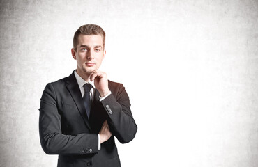 Pensive young business man portrait