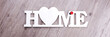 © kelifamily - The word Home in white letters. Panoramic image