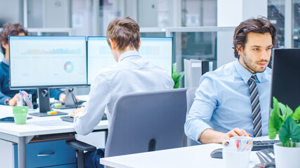 Poster - In the Big Busy Corporate Office Businessman Works on Desktop Computer, Around Him Businesspeople and Experts Working with Clients, Having Discussions and Analysing Statistics