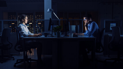 Aufkleber - Working Late at Night in the Office: Workers Use Desktop Computers, Analyzing, Using Documents, Solving Problems, Finishing Important Project. Diligent Ambitious Young Businesspeople. Side View