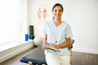 © Louis-Paul Photo - Portrait of a physiotherapy woman smiling in uniforme
