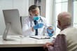 © Yakobchuk Olena - Elderly citizen visiting ophthalmologist for a quick eye check-up