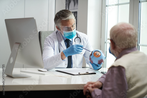 Elderly citizen visiting ophthalmologist for a quick eye check-up