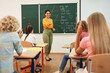 © Yakobchuk Olena - Pupils answering to teacher during english lesson