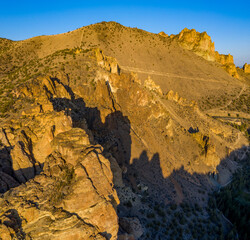 Sticker - landscape, desert, rock, canyon, mountain, nature, sky, travel, mountains, red, stone, view, park, usa, cliff, hill, blue, rocks, tourism, beauty, national, scenic, valley, aerial, drone, bend, oregon