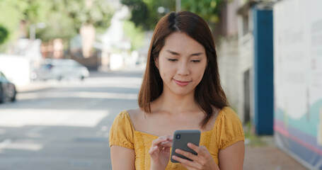 Sticker - Woman use of cellphone at street