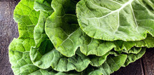 Large Kale Leaves, Loose And Green, Used In Cooking.