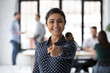 Head shot portrait smiling Indian businesswoman pointing finger at camera at you, satisfied hr manager employer recruiter choosing job candidate, new career opportunity, recruitment and employment