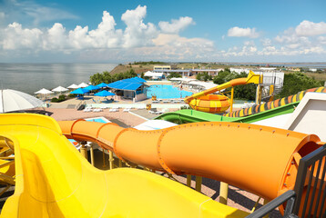 Sticker - View from colorful slides in water park on sunny day