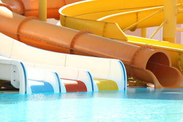 Poster - Different colorful slides in water park on sunny day