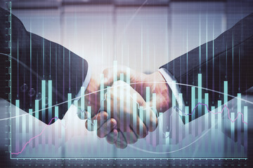 Double exposure of forex graph hologram and handshake of two men. Stock market concept.