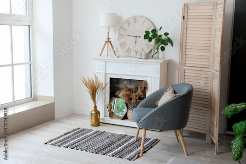 Fotomural Stylish fireplace in interior of living room
