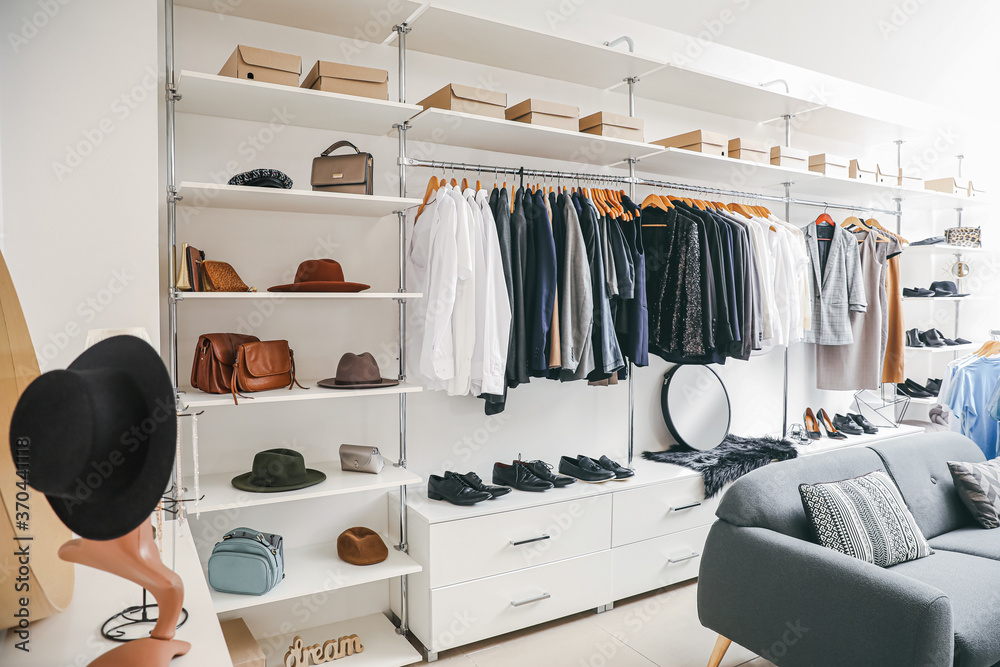 Stylish interior of modern clothes store