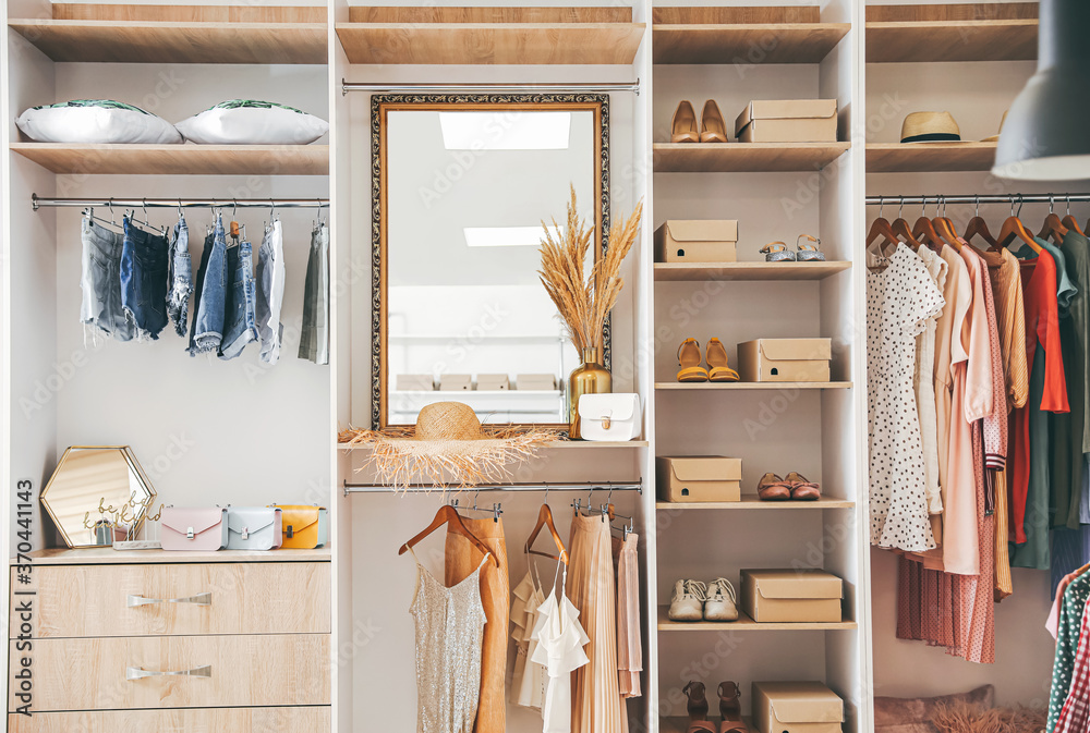 Stylish interior of modern clothes store