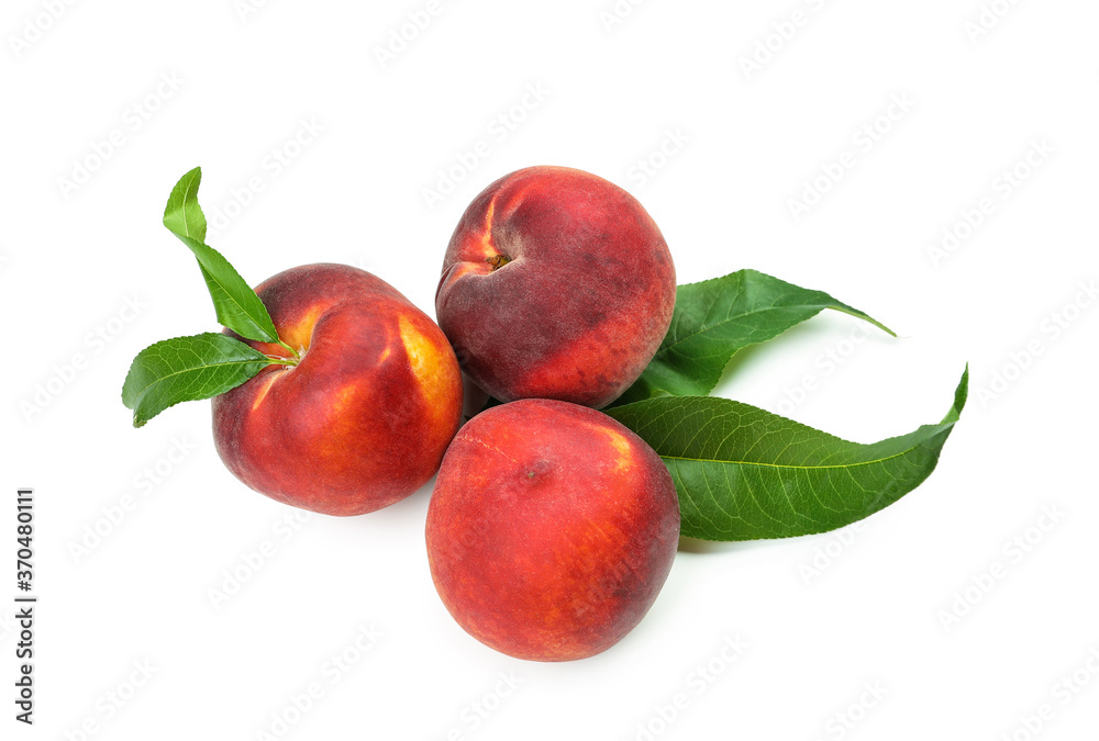 Sweet ripe peaches on white background