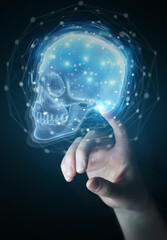 Poster - Man hand using digital x-ray skull holographic scan projection 3D rendering