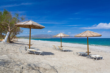 Wall Mural - Parasols at the Maleme beach on Crete, Greece