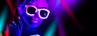 © Subbotina Anna - Disco girl in neon light dancing in night club. Fashion model woman. Closeup portrait of beautiful girl with fluorescent make-up. Body Art design in UV. Sunglasses. Colorful make up