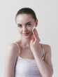 © Utkamandarinka - Powder make up wman applying brush powder skin tone beauty