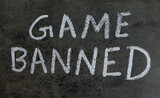 Fototapeta  - Game Banned Phrase Written on Blackboard with White Chalk