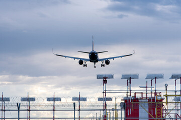 Airplane going to landing, plane in the sky