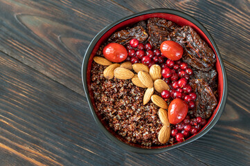 Canvas Print - Bowl of red quinoa with nuts and sun-dried tomatoes