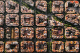 Fototapeta  - Aerial view of typical buildings of Barcelona cityscape from helicopter. top view, Eixample residencial famous urban grid