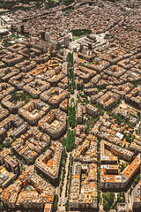 Wall Mural - Aerial view of typical buildings of Barcelona cityscape from helicopter. top view, Eixample residencial famous urban grid