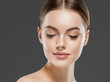 © Utkamandarinka - Beautiful face woman healthy skin gray background