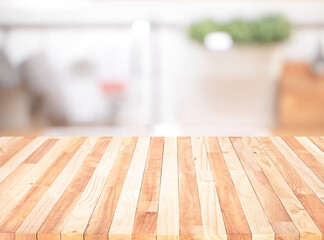 Wall Mural - Wood table top on blur kitchen counter (room)background