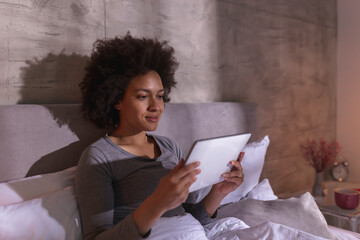 Sticker - Woman checking email using tablet computer