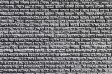 Sticker - The texture of the grey stone wall is decorated with tiles.