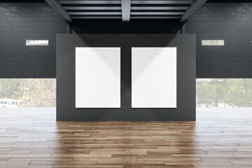 Exhibition interior with two empty banners on black wall