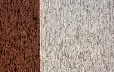 Decorative plaster background in two colors brown and white.