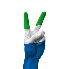 Hand making victory sign, sierra leone painted with flag as symbol of victory, win, success - isolated on white background